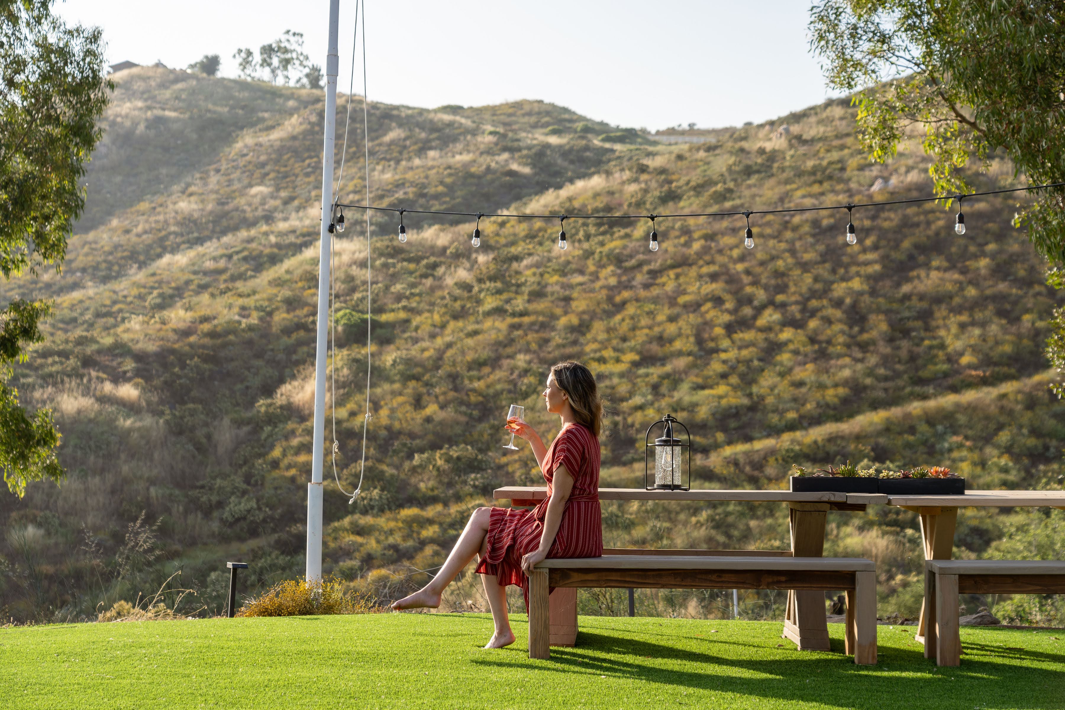Outdoor ceremony space with panoramic mountain and vineyard views