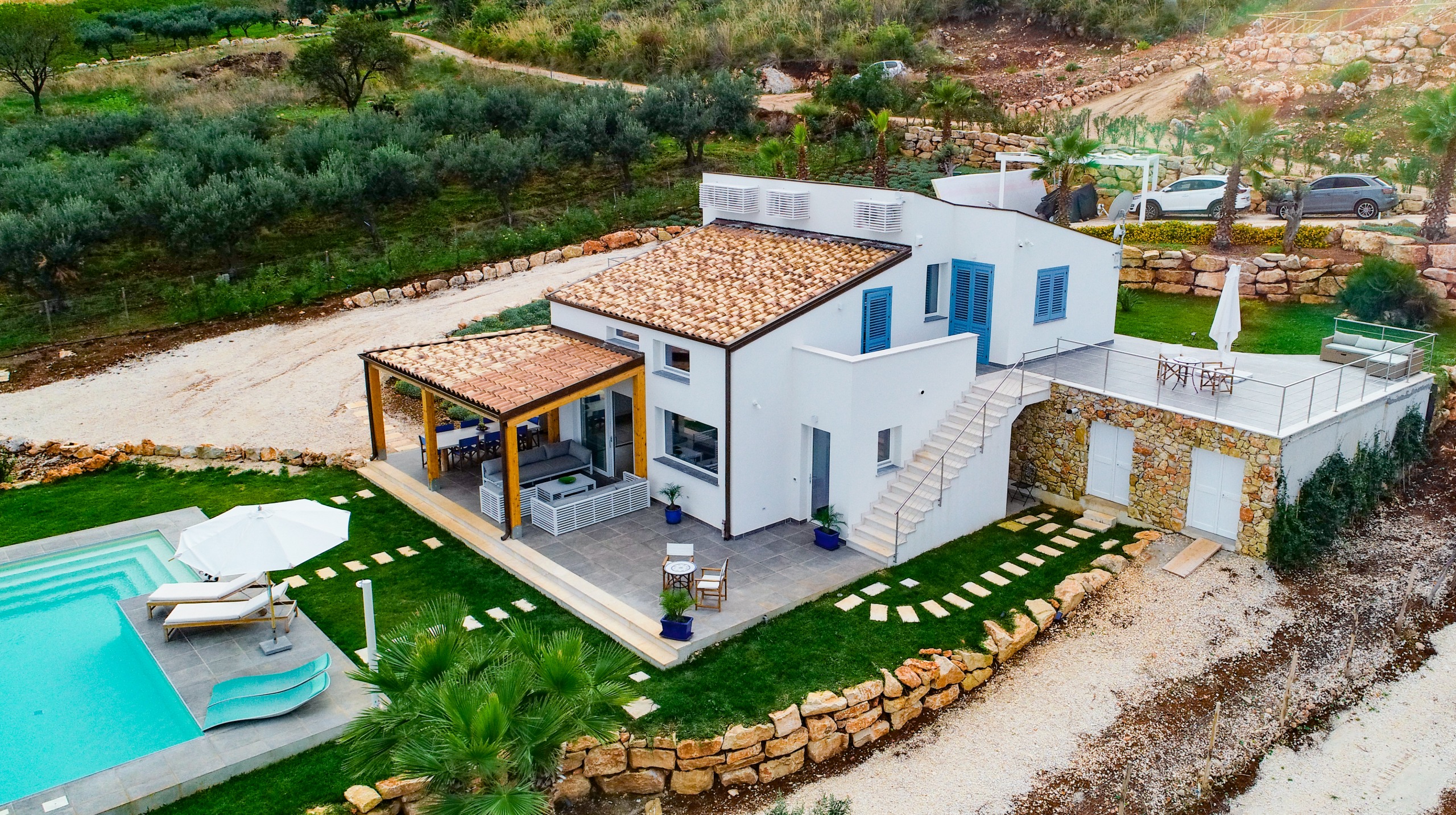 Sicilian villa exterior with Mediterranean views