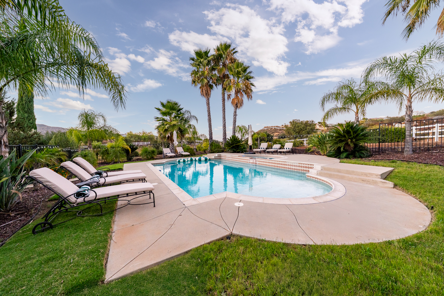 Equestrian villa exterior with rolling vineyard hills and countryside views