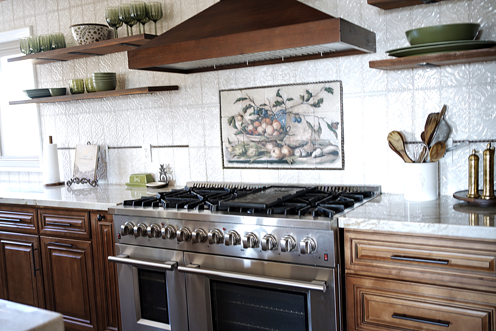 Restoration Hardware living space with vaulted ceilings and Tuscan design elements