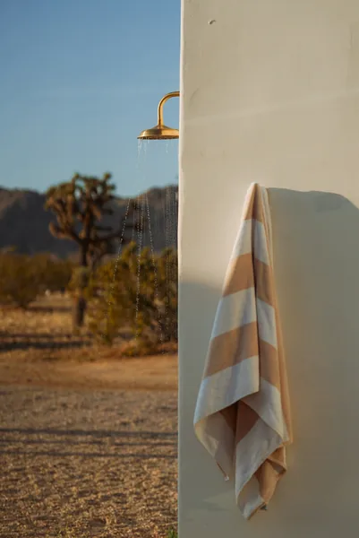 Spa-inspired amenities with hot tub and outdoor showers